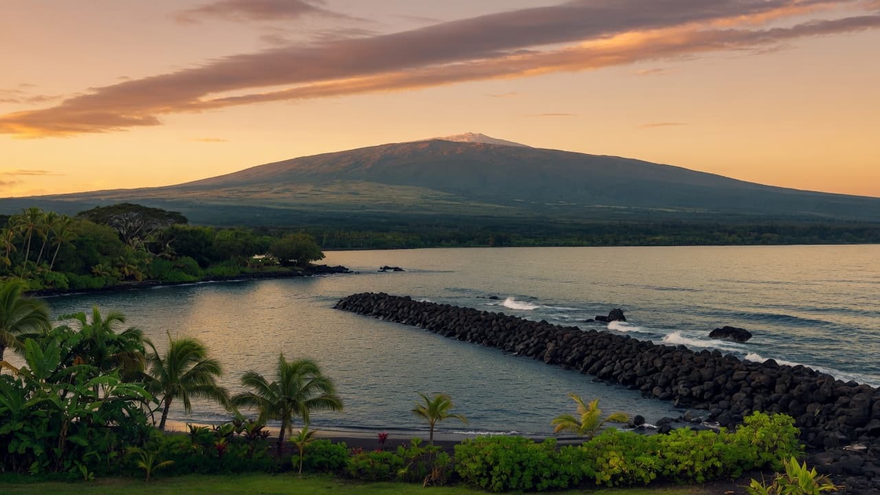 Hilo Bay at sunset with Mauna Kea in the distance